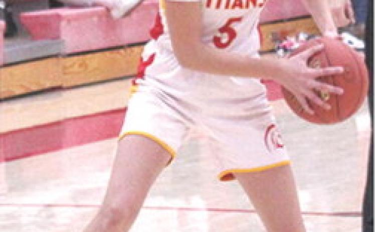 Kipton Saporito, brought the ball down during a home game at the Central Gymnasium recently. The Lady Titan Seventh Grade A Team lost in Galena, Thursday, 14-22, in a rare afternoon game.