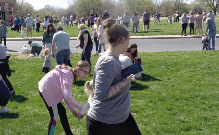 An exceptionally large crowd turned out for the Kiwanis Club Easter egg hunt in Baxter Springs Saturday. Several large prizes were awarded to the winners of the event.