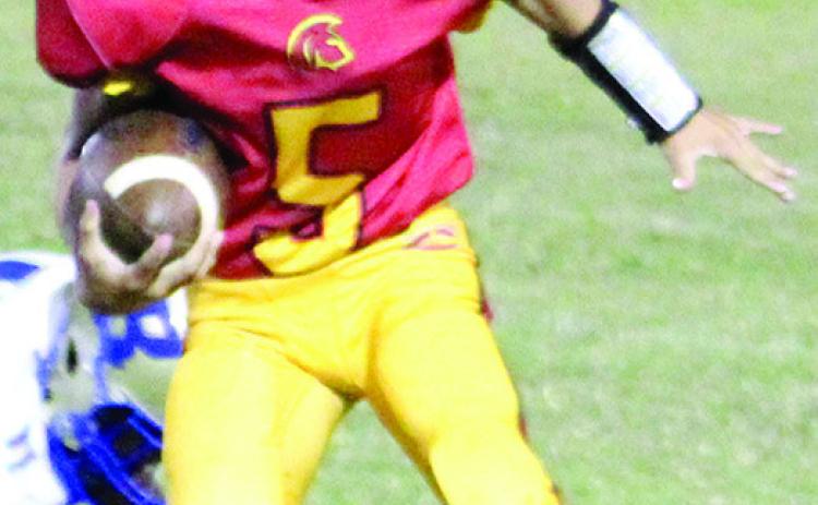 Blaze Bowman rushed for two touchdowns and passed for one in the Junior High Titans Seventh Grade shutout over Riverton, 22-0, Thursday at Titan Stadium.