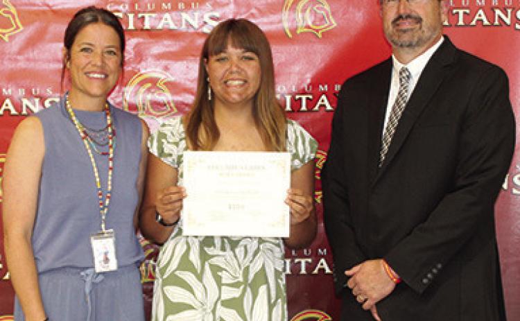 Katelyn Draeger received the $500 Class of 1986 Friendship Scholarship and the Charles and Jane Maxwell Memorial Scholarship for $750 (renewable for four years) during the May 15 Senior Assembly at the Columbus Unified High School Gymnasium. CACF Board Member, Kelly Walters and USD 493 Superintendent Dan Grundy presented the awards.