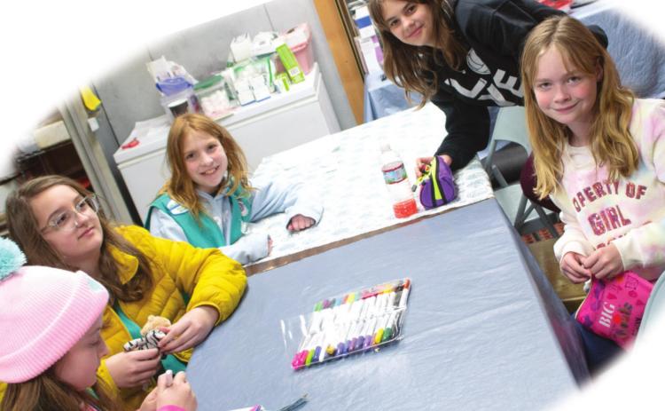 Area Girl Scouts work to earn first aid badge