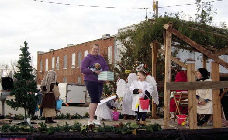 A living Nativity scene adorned the float created by Scammon Holiness Mission. The group entered their float in the Scammon Christmas parade, winning first place.