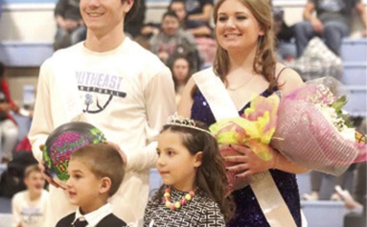 Cade Burdette and Samantha Dietz were crowned Southeast Homecoming King and Queen. Crown bearers were Jacob Nichols and Paislee Fowler. Both the Southeast boys (69-37) and girls (39-27) were victorious over Colony Crest at SE Homecoming February 3. Courtesy photo.