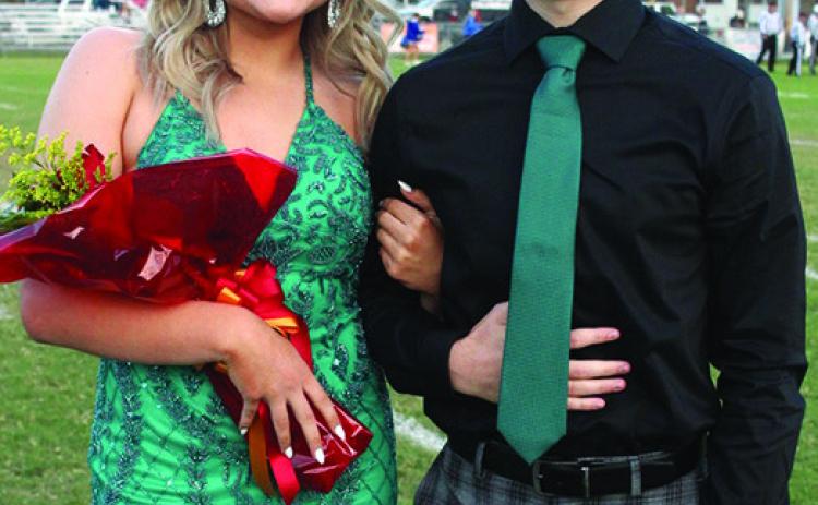 Lady Titan Senior, Macey Allison, was chosen as 2023 Fall Homecoming Attendant, Friday night, prior to the football game with St. Mary’s-Colgan. Macey is the daughter of Jason and Nicole Allison. She was escorted by Luke Gray, son of Amy Gray and the late Travis Gray.