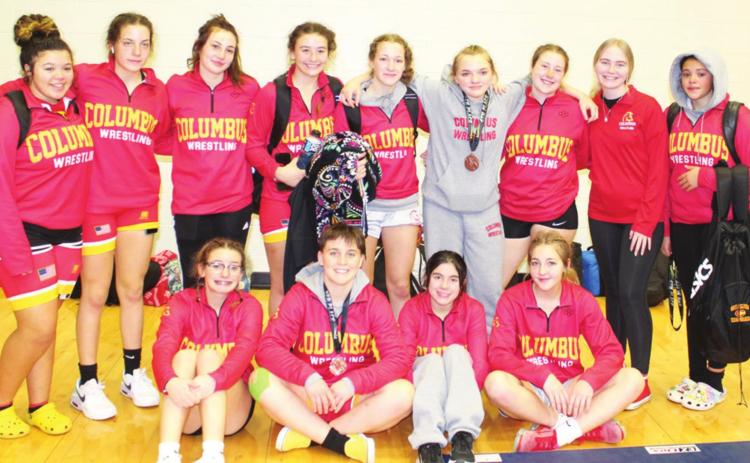 The Lady Titan Wrestling Team placed third a the Bentonville West Tournament, Friday, to close out their pre-Christmas break schedule. Columbus scored 76 team points to place third behind two Arkansas power house schools, Searcy and Fayetteville. Team members are back row: Destiny Lima, Aubree Saporito, Madelyn Garcia, Jailyn Rodguiez, Emily Britt, Taryn Billings, Manager, Suzanne Crowe, and Brooklyn Lima. Front row: Sophie Lloyd, Emily Welch, Grace Noel, and Harley Long. Photo by Crystal Welch.