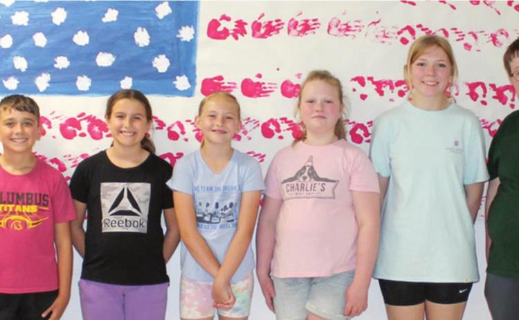 Missouri youth group helps assemble care boxes