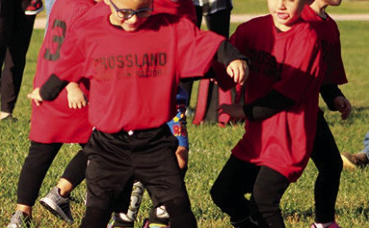 Columbus Area Youth Soccer will complete their season tomorrow at Eddington Park. All age groups will be in action beginning at 8 a.m. Bronson Dainty looks to make a pass while teammate Rowan Benedict assists during recent action on the Froebe Fields soccer pitch.