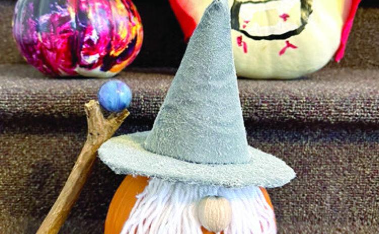 Johnston Public Library in Baxter Springs recently had a pumpkin decorating contest. The winning pumpkins included left or right zero- age 5 winner: Miss Colors by Hadley Vanderbeck, 12-18 year winner: Wizard by Becca Webb, ages 6-11 winner: Dracula by Gracie Thompson. Courtesy photo.