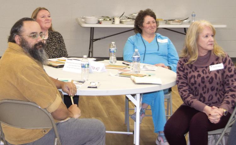 At one of the eight tables were local businessman Clinton Cooper