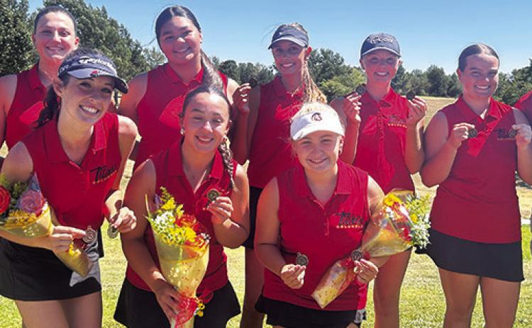 The Lady Titan Golf Team opened their CNC League schedule with a win on their home course, Thursday, at Brush Creek. The team also recognized the 2026-27 seniors in their final home tournament. Front row: seniors, Natalie Wary, Hannah Noel, and Amory Neely. Back row: Tyler Kirk, Elaina Garcia, Kristen Flinn, Addison Johnson, top medalist for the day, Cali Carpino, Fallon Smiley, and Head Coach Jerry Smiley. Courtesy photo.