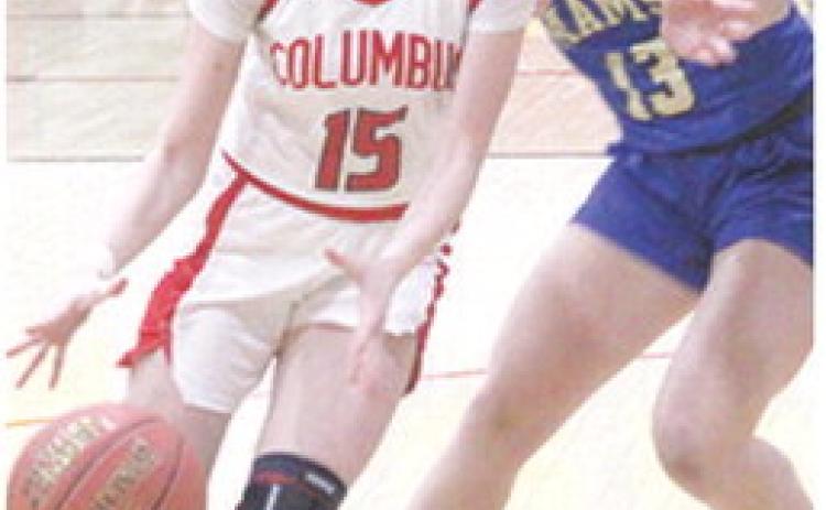 Lady Titan Sophomore, Natalie Wary, gets past her Riverton opponent in the February 4 loss to the Lady Rams. Columbus lost on the road at St. Mary’s-Colgan, Friday, 27-63.