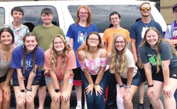Honor Choir students line up ready to load the bus for a three day trip to Topeka. Back row left to right Michael Karguth, Graiesun Sneed, Lex Holtwick, Josh Martin, Carter Dinger and Paul Pommier. Front row left to right Kelsey Brown, Loryn Moser, Olivia Barr, Emily Ford, Anna Riley and Emma Walker. Not pictured is Choral Director Brenda Locke and sponsor Ross Davis. Photo by Dee Riley.