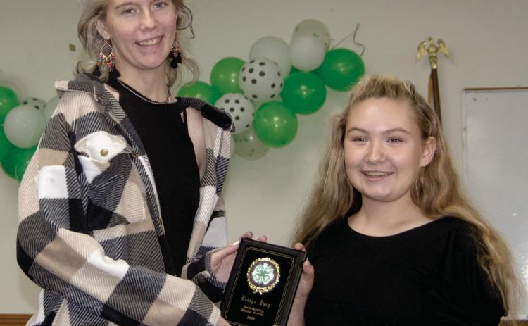 Jadeyn Ivey a member of the Spring Valley Sparklers, was named the Senior 4-H’er of the year. A ten year member of 4-H Jadeyn has been involved in Style Review, photography, cooking, arts and crafts, goats, breeding cattle, market lamb and the dog project. She is always been quick to help the younger kids and strives to make the best better.