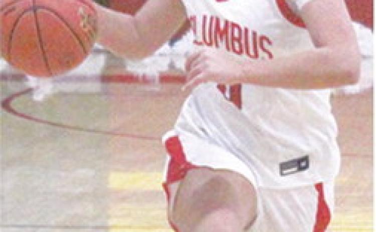 Lady Titan Senior, Katy Mooney, gets a steal and drivers for the layup in the 41-60, Columbus loss to Cherryvale, Tuesday, at the CUHS Gym. Katy scored 22 points going 13 of 14 at the free throw line.
