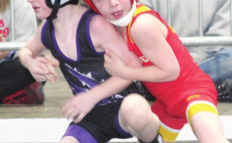 Baylor Bowman, Columbus Wrestling Club six yearold placed third in the 8U, 49-pound class at the USAWKS 2022 State Championship, Sunday, in Topeka. Baylor placed third in the 6U state tournament in Mulvane the week before. Courtesy Photo.