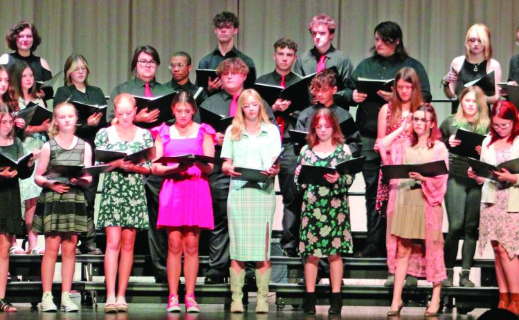 Titan Choir held their Spring Concert recently. Members of the combined Titan Choir performed Hitch A Ride by Marry Donnelly, arranged by George Lo. Strid. The choirs are under the direction of Stacey Struble.