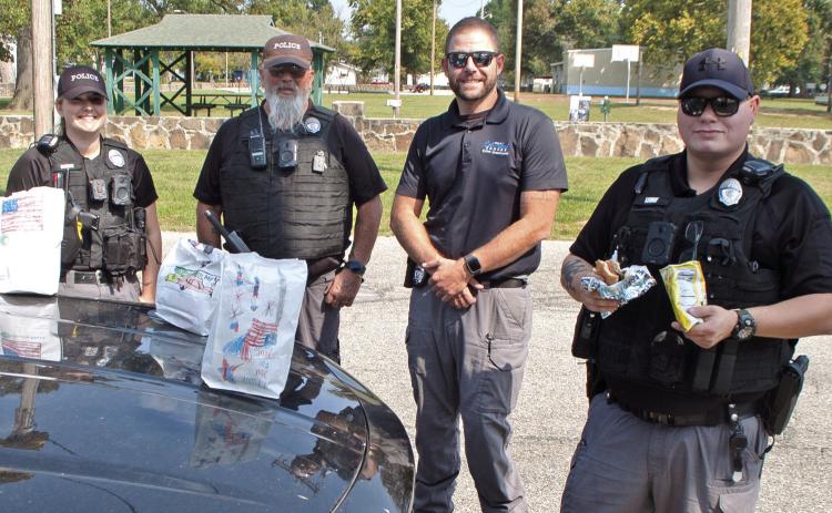 Columbus first responders and veterans were treated to a free lunch Wednesday in memory of the events that occurred September 11, 2001. Columbus Police Department was represented by Officer Denise Burns, Animal Control officer Jeff Woods, Chief of Police Kyle Clark and Officer Arlo Lewke.
