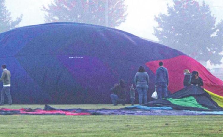 Visitors who arrive early for the Hot Air Balloon Glow and Regatta will be able to see first hand how the pilots and crews lay out the balloons and get them ready for inflation. It takes a number of hands to make sure everything is positioned perfectly. The first glow is scheduled for Friday, October 8 at approximately 6:45 p.m.