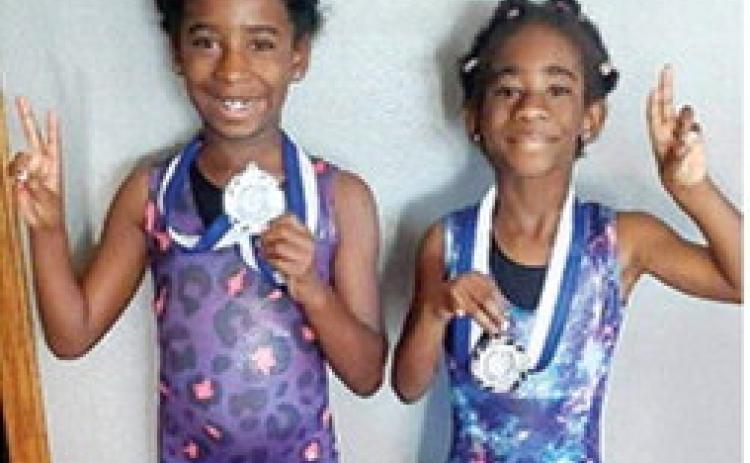 Lyiah and Kyra Lacen placed second in their eight and under weight classes at the Carthage, Mo. Youth Tournament, January 17. Courtesy photo.