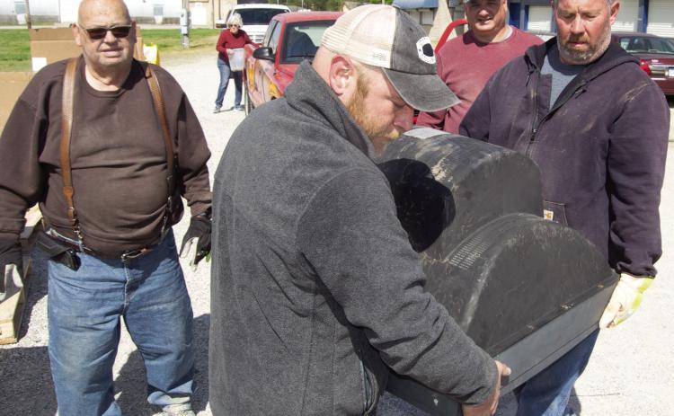 City workers Anthony Bole, Kenny Mitchell and Joey Midgett were working Saturday unloading electronic waste for the collection. Two semi-trailers-were filled in the five hours. Cherokee County Solid Waste Committee sponsored the event, chairman Jim Burton supervises the loading process.