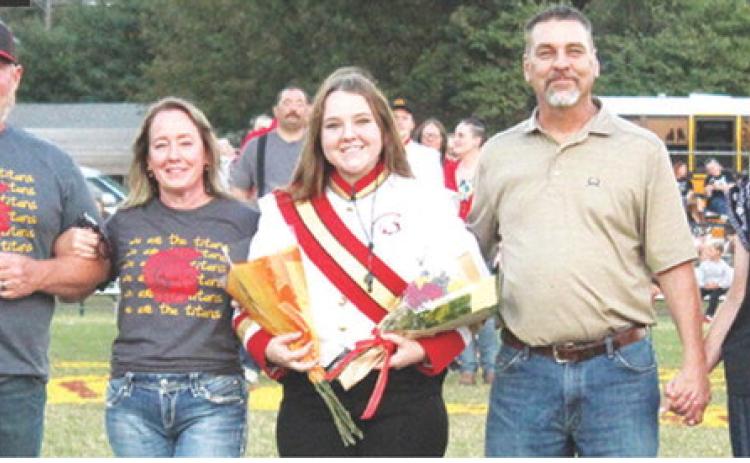 Senior, Natalie Edmondson, was recognized during Senior Night Ceremonies at Titan Stadium, October 17. Natalie is a four-year member of the Titan Band. She was escorted by her parents Raymon and Stacy Delmont and Derek and Sandra Edmondson.