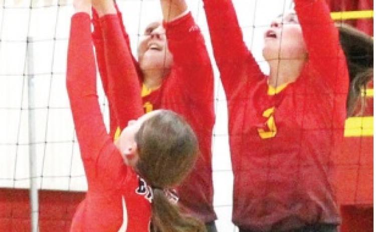 Lady Titan hosts triangular meet