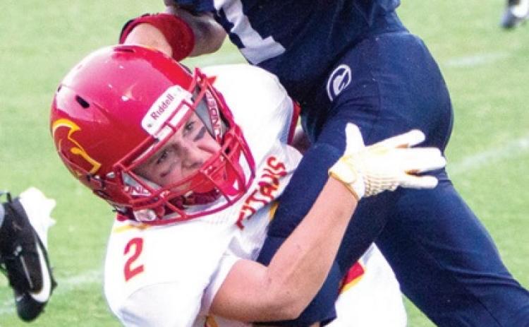 Last second TD propels Titans over Bulldogs