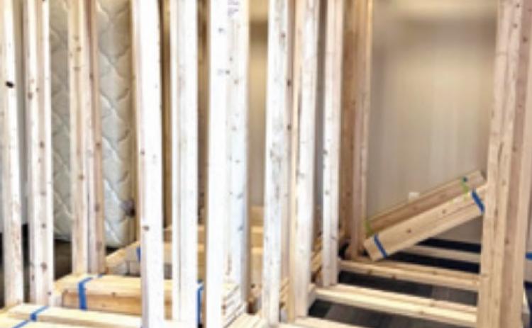 CUHS students build beds for kids