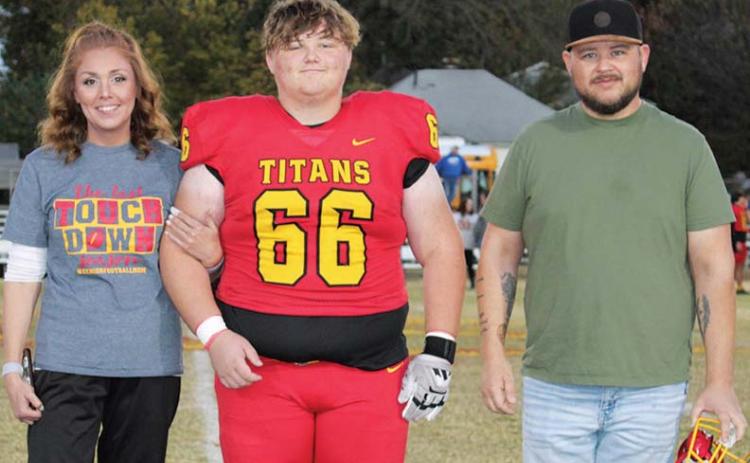 Titan Senior, Austin Glover, was recognized on Senior Night, October 25, at Titan Stadium. Austin is a three-year member of the Titan Football Team. He was escorted by his parents Erin and Jared Glover.