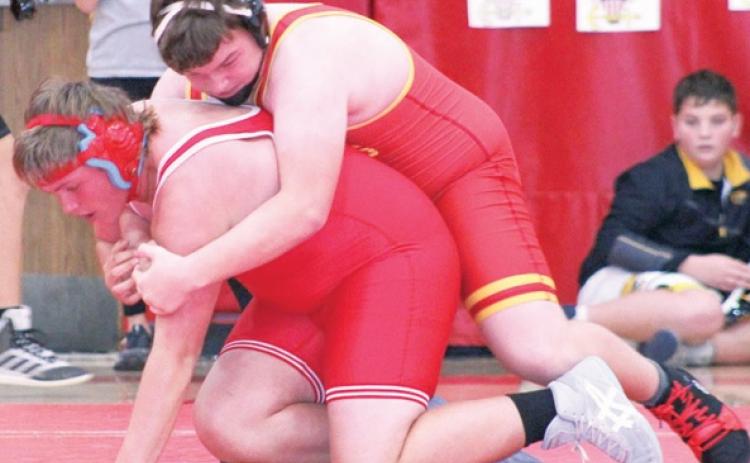 Smith wins three in junior high wrestling scramble
