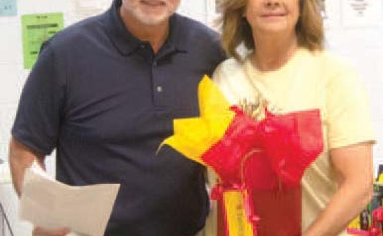 Tammy Burton with Superintendent Dr. Brian Smith.
