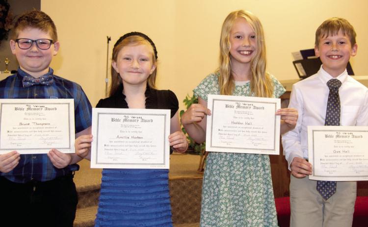 Bruce Thompson, Amillia Hudson, Haddon Hall and Gus Hall were all recognized at the recent Life Christian awards ceremony. Each youngster memorized 90 Bible verses.