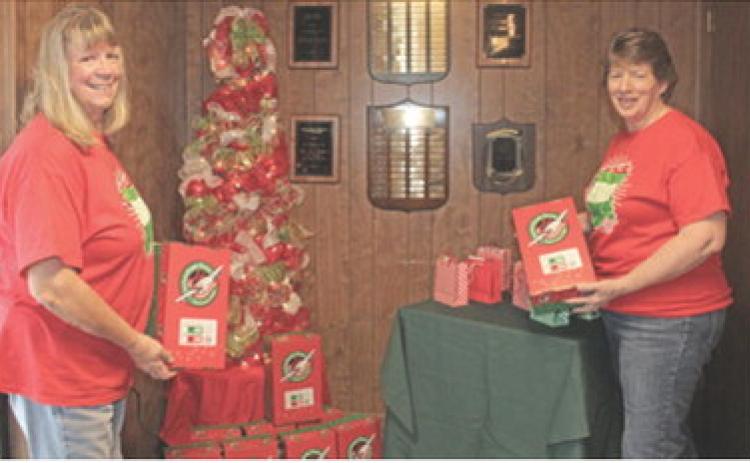 Charlotte Scott and Linda Griffitt are volunteers at the Columbus First Baptist Church drop off location for Samaritan’s Purse Operation Christmas Child. If you would like to donate items or money for a box, contact the church.