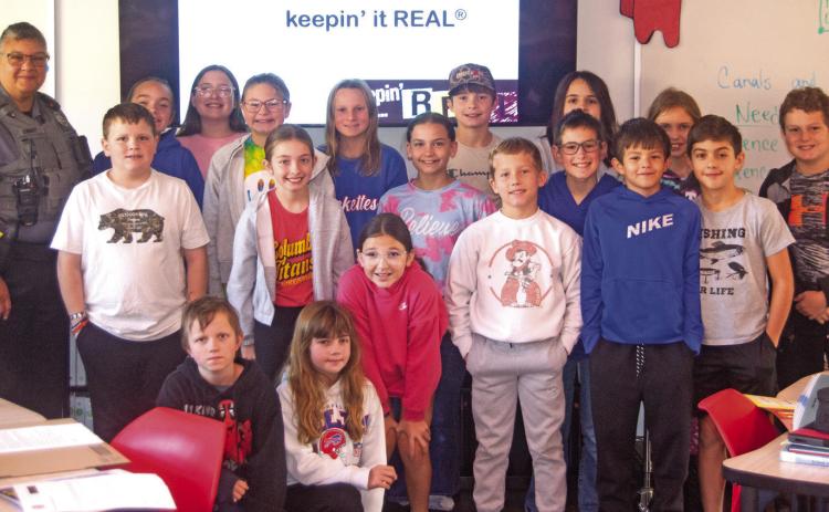 The D.A.R.E program met in Michele White’s fifth Grade class November 7. The program is about bringing drug awareness to young minds and teaching them to make responsible decisions and good, healthy, choices as they grow. Photo by Shawn Churchill.
