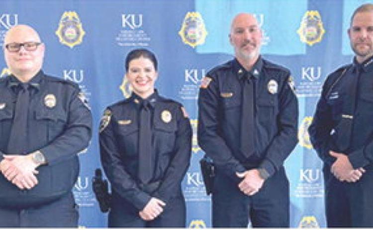 Aeriel Tennell recently completed classes at the Kansas Law Enforcement Training Center. She is employed by Columbus Police Department. Officers Arlo Lewke, Preston Hosier and Chief Kyle Clark attended her graduation ceremony. Courtesy photo.