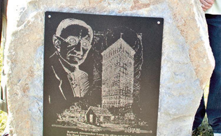Standing silently at the corner of Kansas Avenue and Walnut Street, just a block off the Columbus Square, is a small monument in honor of RA Long.