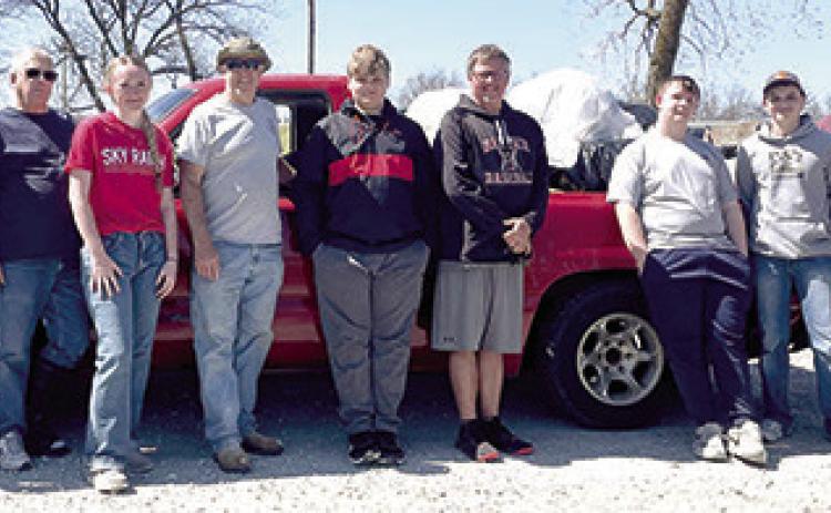 Members of the Baxter Springs Kiwanis and Key Clubs spent a Saturday morning recently cleaning up the city of Baxter Springs. Courtesy photo.