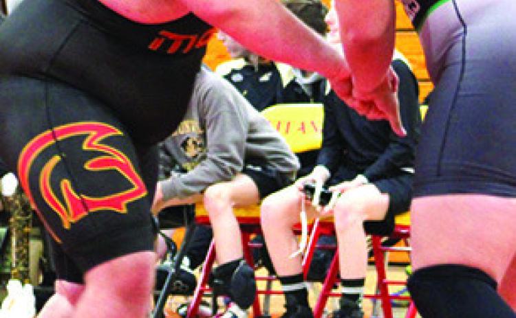 Titan Senior, Jake Eddington, opens his match with Van Buren’s Ethan Hurst. Jake won the match by fall, one of his five wins in the Titans Five-Team Duals held December 17 at the CUHS Gym.