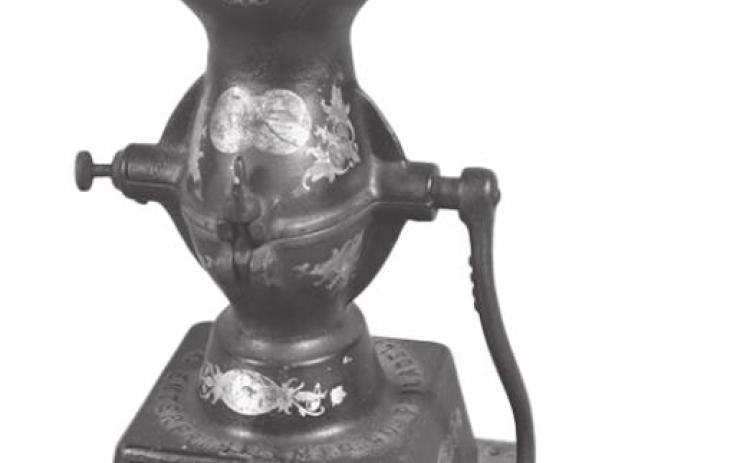 This strange looking cast-iron tool is a coffee grinder. Beans go in the top, the lid is put in place and the beans are ground and drop into the lower section mounted on a wooden base. It sold for $413 a few years ago.