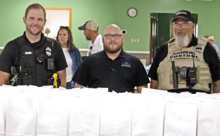 A large number of law enforcement officers and emergency services personnel came out to the fundraiser in support of the family of Jason Daniels. Chief Kyle Clark, Officer Marcus Harmon and Animal Control Officer Jeff Woods were among those in attendance. Chief Daniels was a vital part of the community and there will be a celebration of life service Saturday, June 8 in the Oswego City Park from noon to 4 p.m. for those who would like to attend.