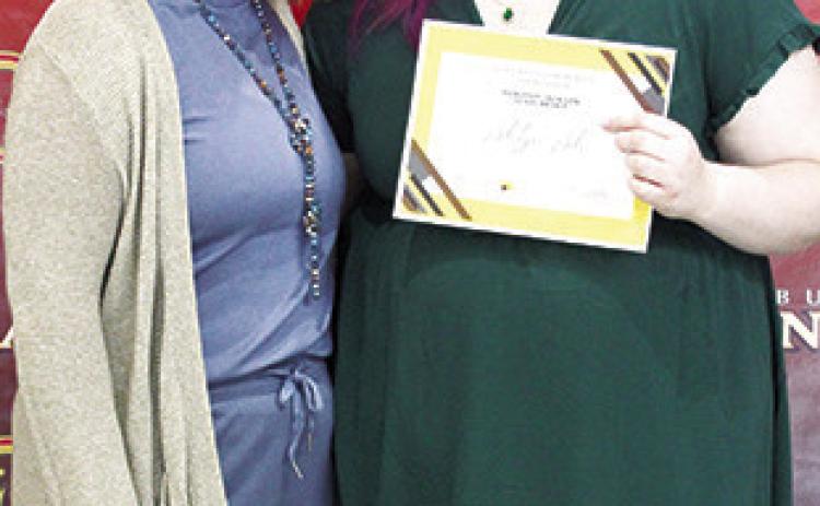 Ashlyn Ash received the Dorothy Jackson Columbus Community Foundation Scholarship in the amount of $2,000 at the Senior Assembly, May 16, in the Columbus Unified High School Gymnasium. The presentation was made by Kelly Walters, USD 493 Title 1 Reading Specialist.