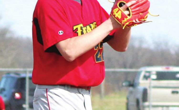 Junior Titans split with Trojans