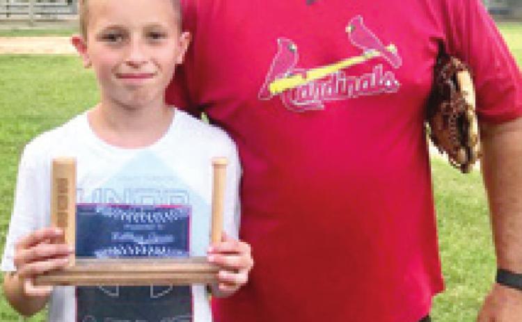 Coach, Todd Robinson presents the Riverton Little League 2021 Jimmy Gibson Memorial Sportsmanship Award to Matthew Gibson. Courtesy Photo.