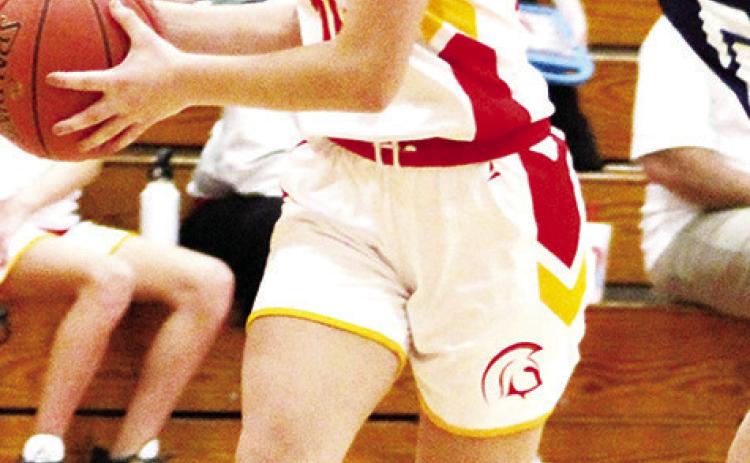 Lady Titan Seventh Grader, Americus Woodcock, drives past the Galena defender on her way to a basket in the CJHS 33-8, win over the Lady Bulldogs in the 7A game, Tuesday, at the CUHS Gym.