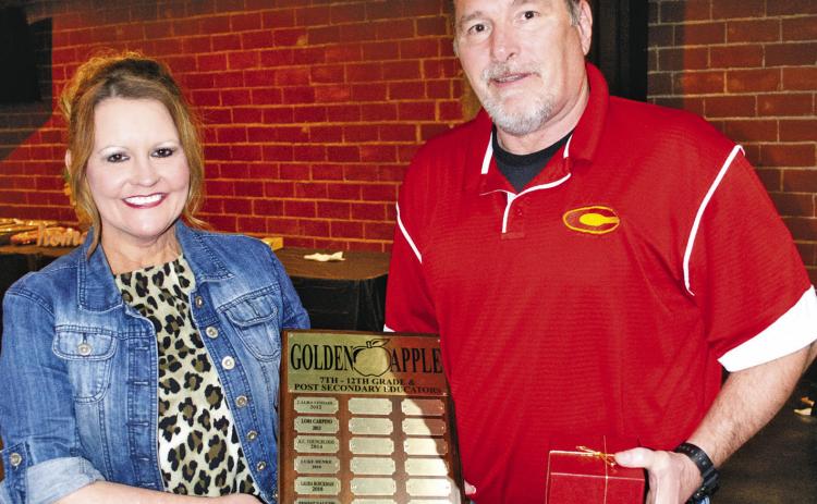 Ernie Vaughn was presented with a Golden Apple at a past Chamber banquet. Send your nominations to the Chamber of Commerce for the next award winner.
