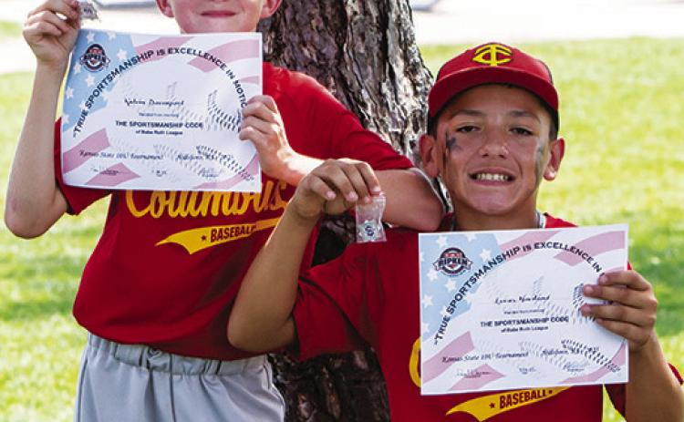 Two Columbus Cal Ripken 10U All-Stars earning their certificate and pin for memorizing the Cal Ripen/ Babe Ruth Sportsman Pledge are Kalvin Davenport and Lucas Haviland at the 10U state tournament in Hillsboro, July 16-20. The pair were also nominated for the All-Tournament Team. Photo by Kristin Sharp.