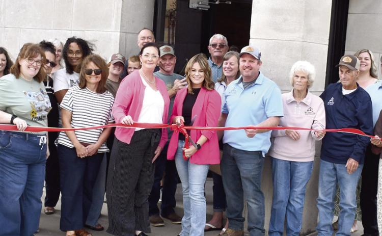 A ribbon cutting was held recently for Burton Real Estate. Owner Nikki Burton and husband Corey Burton have opened her office on the corner of Maple and Kansas.
