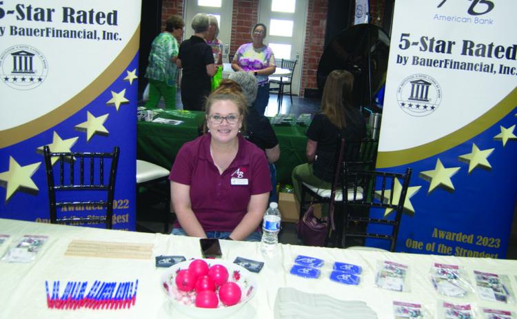 One of the active booths at the Business and Health Expo was the American Bank site. Jessica Gilman answered questions and passed out gifts to the visitors.