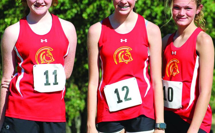 Members of the Lady Titan Eighth Grade Cross Country Team hosted a cross country meet, Tuesday, at the Brush Creek Golf Course. Kennedy Reichardt placed eighth, Natalie Wary was third, and Laney Atkinson placed fifth on the 3200 meter course.