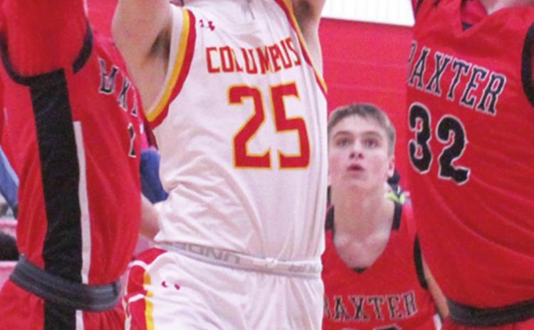 Titan Freshman, Jack Vilela, goes up for two of his team-high, 11 points in the junior varsity loss to Baxter Springs. Tuesday at the Central New Gym. Freshman, Jacob Grant, sophomore, Payton Gaines, and junior, Logan Gess defend for the Lions.